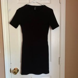 Black mini rubbed bodycon dress